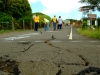 Kapaau, HI, October 25, 2006- DOT crews observe a  long crack that splits the pavement at Pololu Lookout after two earthquakes struck the Big Island of Hawaii. Adam DuBrowa/FEMA.